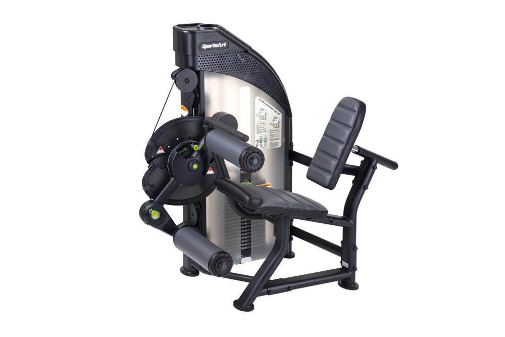 A black and gray leg extension gym machine with padded seat and rollers.